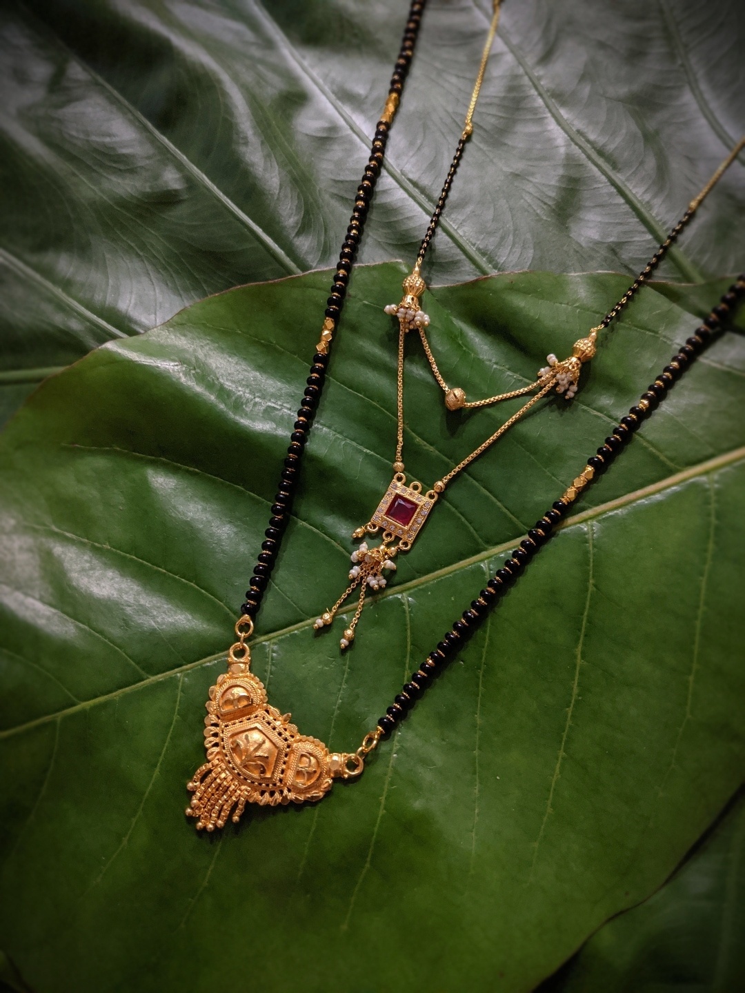 Digital Dress Room Set Of 2 Gold-Plated Black & Red Stone-Studded & Beaded Mangalsutra
Digital Dress Room Set Of 2 Gold-Plated Black & Red Stone-Studded & Beaded Mangalsutra