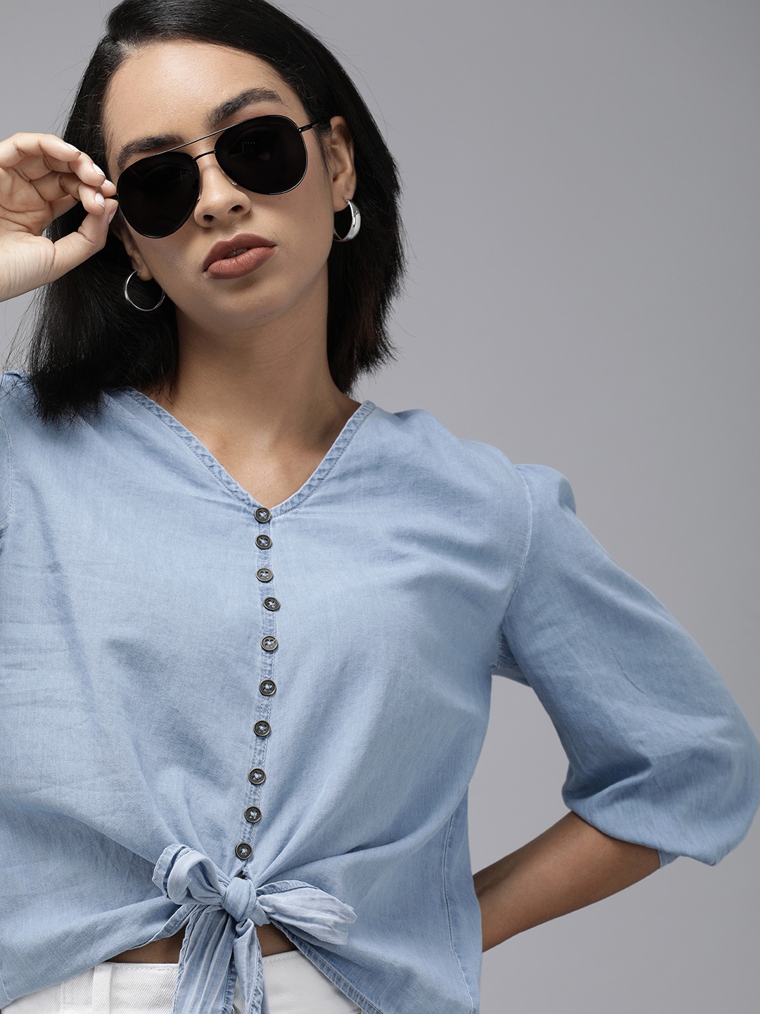 The Roadster Lifestyle Co Women Blue Denim Pure Cotton Cropped Regular Top with Front Knot
The Roadster Lifestyle Co Women Blue Denim Pure Cotton Cropped Regular Top with Front Knot