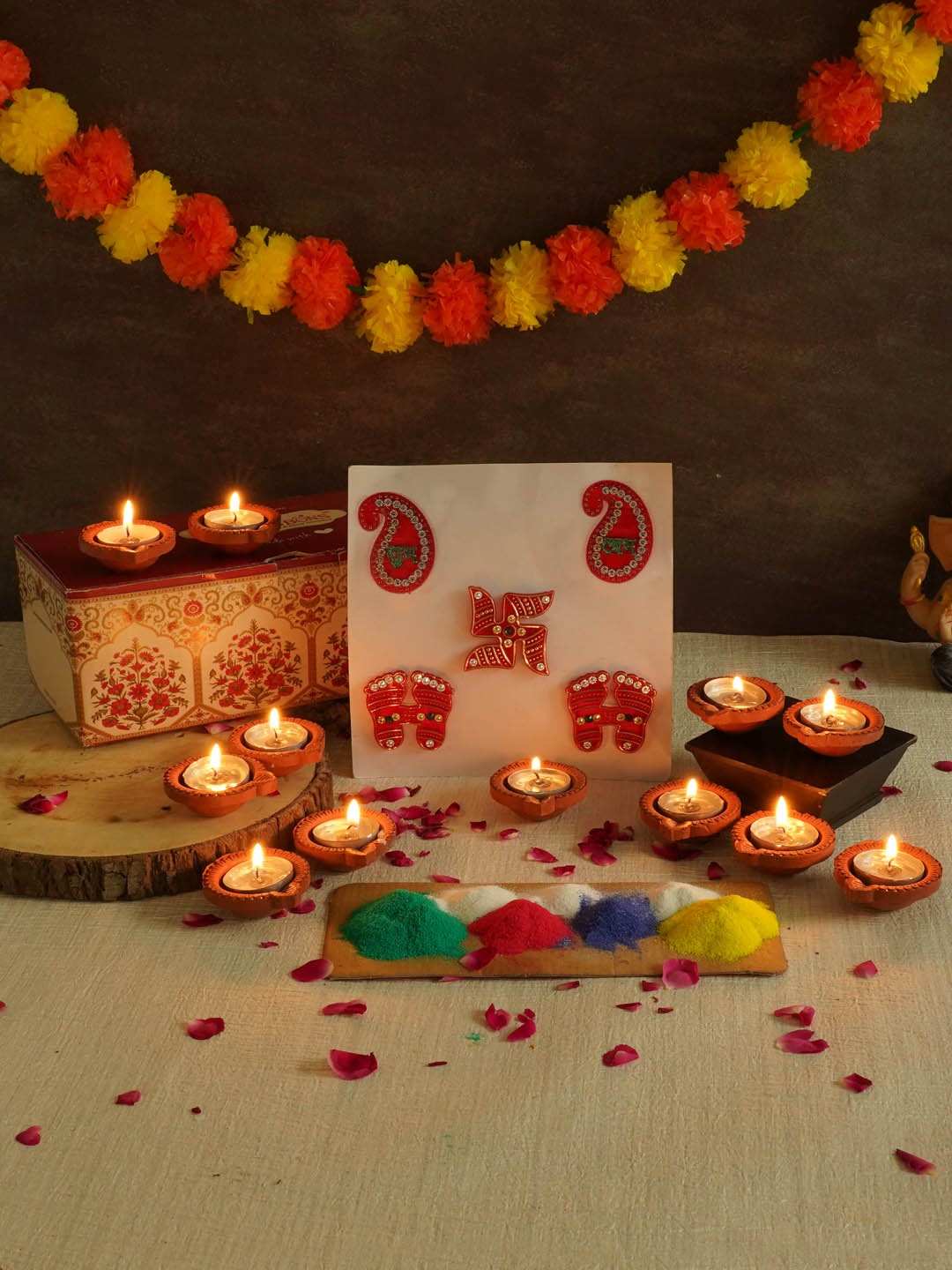 TIED RIBBONS Set of 12 Terracotta Diya with Multi Rangoli Colours & Shubh Labh Stickers, Gold
TIED RIBBONS Set of 12 Terracotta Diya with Multi Rangoli Colours & Shubh Labh Stickers, Gold
