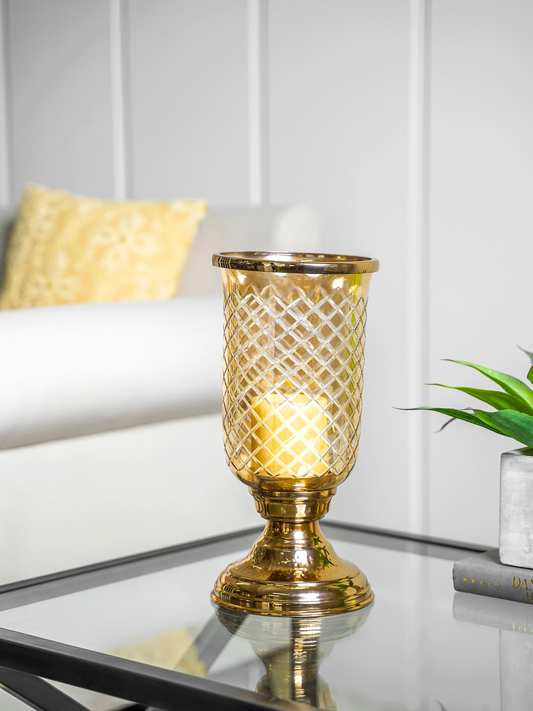 Pure Home and Living Gold-Toned & Transparent Glass Hurricane Candle Holder
Pure Home and Living Gold-Toned & Transparent Glass Hurricane Candle Holder