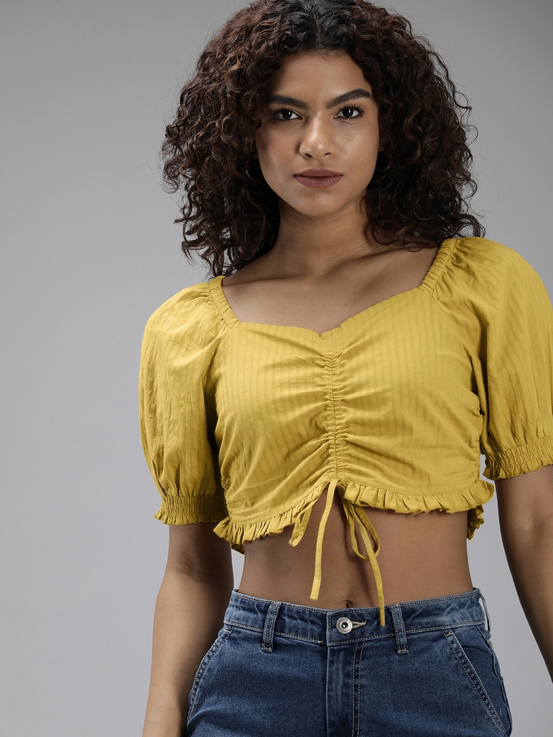 The Roadster Lifestyle Co. Pure Cotton Striped Blouson Crop Top With Tie Up Details, Mustard
The Roadster Lifestyle Co. Pure Cotton Striped Blouson Crop Top With Tie Up Details, Mustard