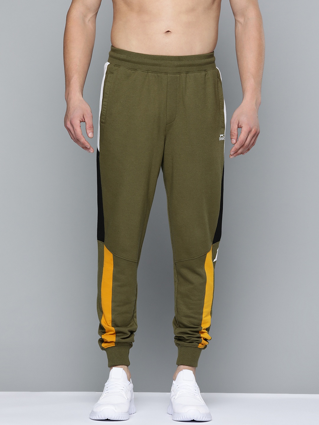 Slazenger Men Olive Green Solid Bio-Wash Athleisure Joggers with Contrast Side Panelling
Slazenger Men Olive Green Solid Bio-Wash Athleisure Joggers with Contrast Side Panelling