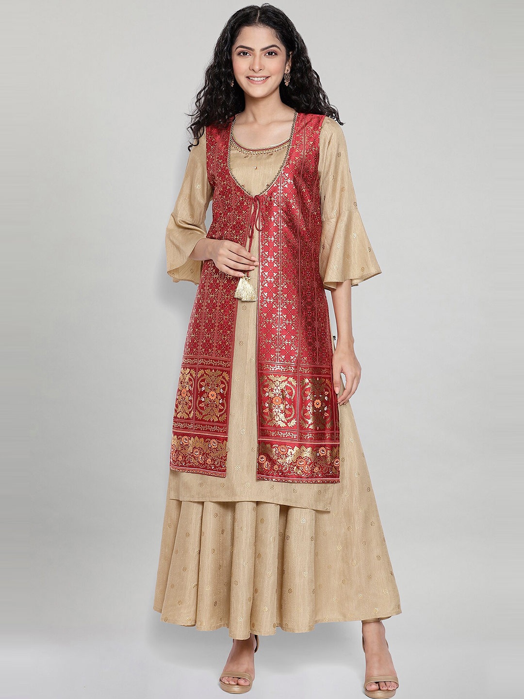 AURELIA Women Maroon & Beige Ethnic Motifs Printed Regular Kurta with Palazzos & Jacket
AURELIA Women Maroon & Beige Ethnic Motifs Printed Regular Kurta with Palazzos & Jacket