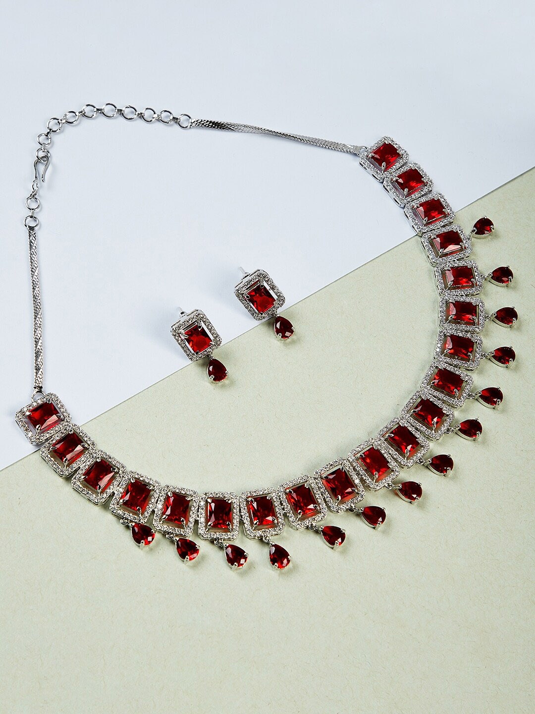 GloBox By ZeroKaata Rhodium-Plated Silver Toned & Red American Diamond Studded Jewellery Set
GloBox By ZeroKaata Rhodium-Plated Silver Toned & Red American Diamond Studded Jewellery Set