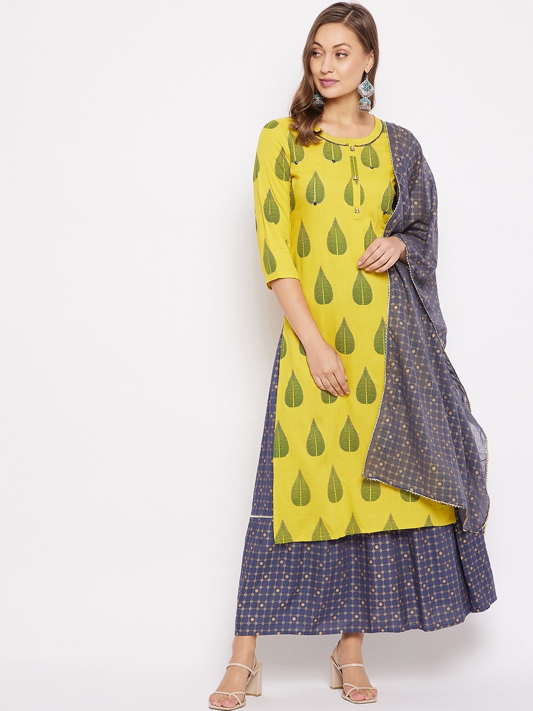 Prakhya Women Yellow Ethnic Motifs Printed Layered Kurta with Palazzos & With Dupatta
Prakhya Women Yellow Ethnic Motifs Printed Layered Kurta with Palazzos & With Dupatta