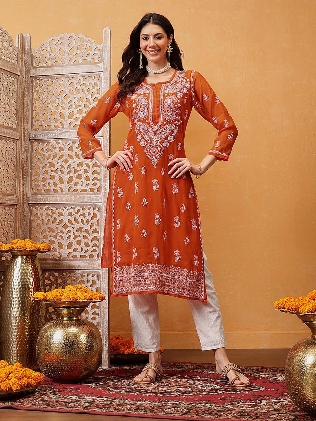 ADA Women Orange Ethnic Motifs Embroidered Chikankari Handloom Georgette Kurta with Slip
ADA Women Orange Ethnic Motifs Embroidered Chikankari Handloom Georgette Kurta with Slip
