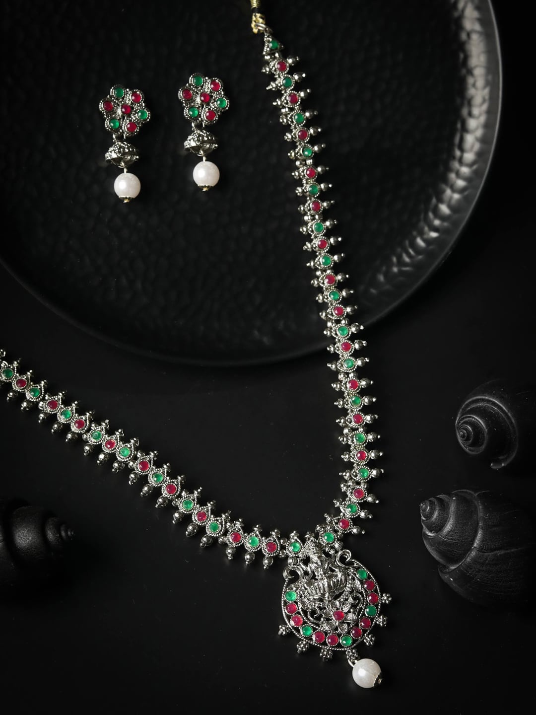 Priyaasi Silver-Plated Green & Red Stone-Studded Ruby Emerald Handcrafted Jewellery Set
Priyaasi Silver-Plated Green & Red Stone-Studded Ruby Emerald Handcrafted Jewellery Set