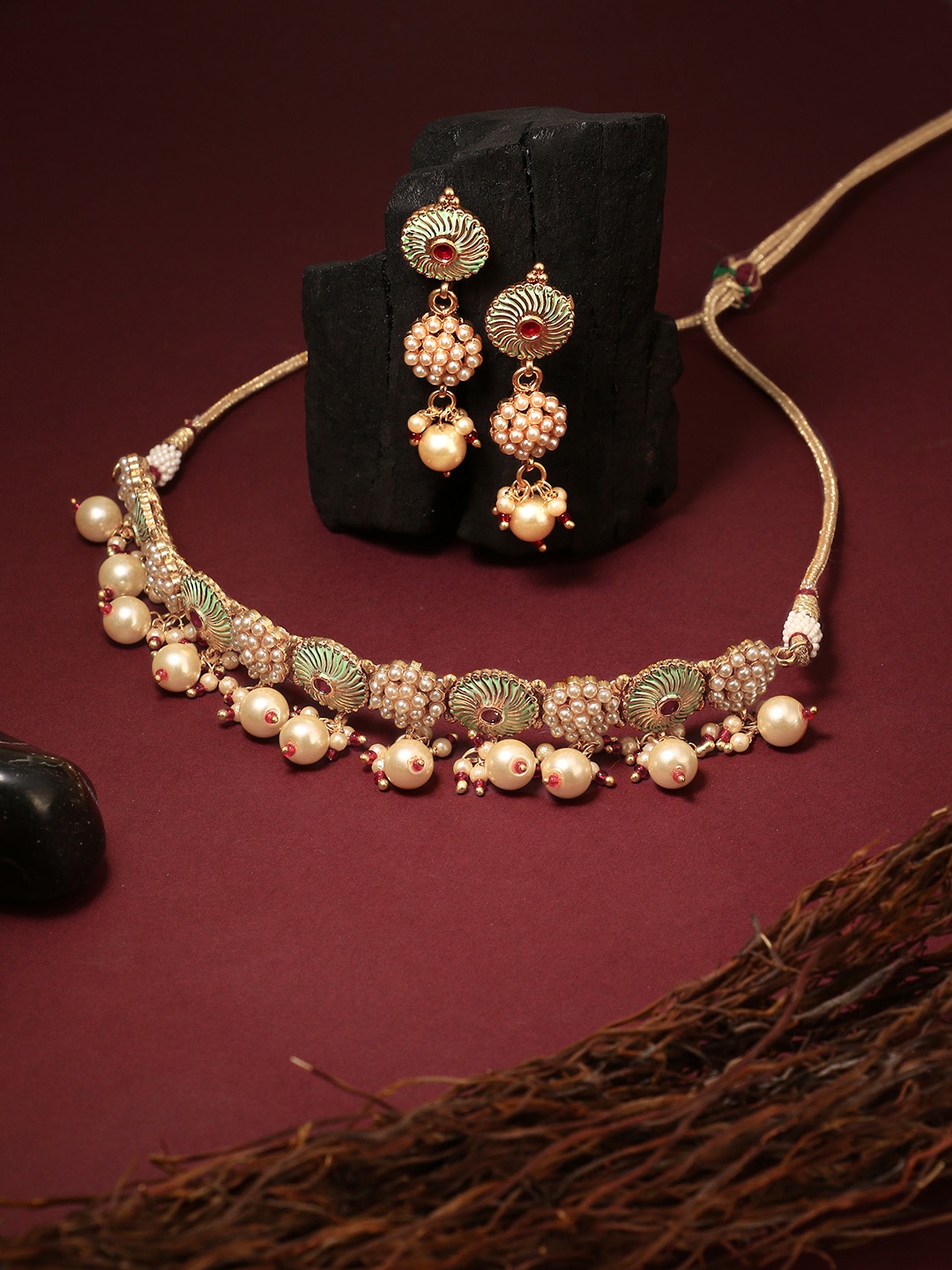 Adwitiya Collection 24CT Gold-Plated White & Red Stone-Studded & Pearl Beaded Meenakari Jewellery Set
Adwitiya Collection 24CT Gold-Plated White & Red Stone-Studded & Pearl Beaded Meenakari Jewellery Set