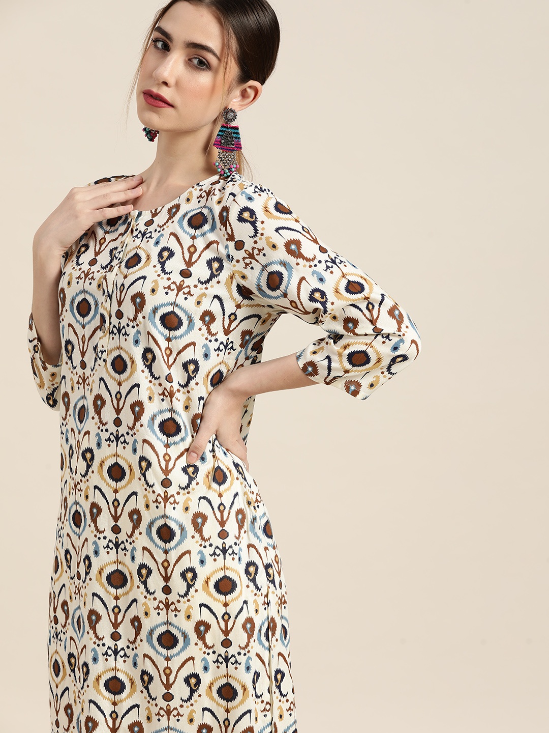Moda Rapido Women Off White & Brown Ethnic Motifs Printed Kurta with Palazzos
Moda Rapido Women Off White & Brown Ethnic Motifs Printed Kurta with Palazzos