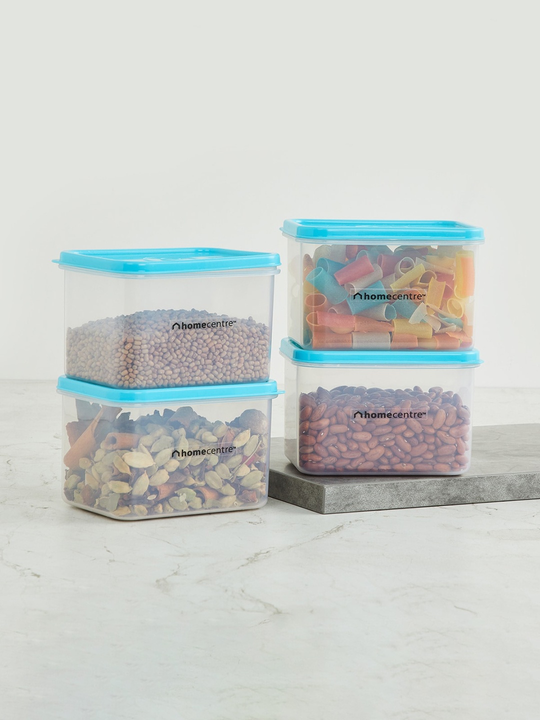 Home Centre Set Of 4 Blue & Transparent Polypropylene Storage Container With Lid 650 ml
Home Centre Set Of 4 Blue & Transparent Polypropylene Storage Container With Lid 650 ml