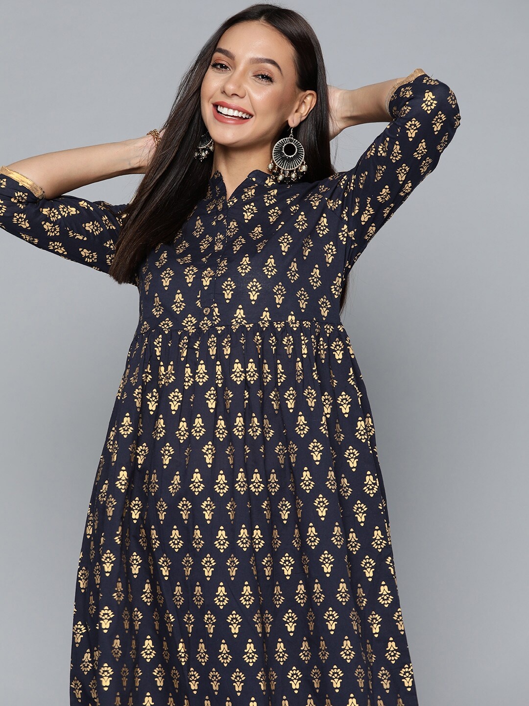HERE&NOW Women Navy Blue & Golden Pure Cotton Ethnic Motifs Printed Block Print Kurta
HERE&NOW Women Navy Blue & Golden Pure Cotton Ethnic Motifs Printed Block Print Kurta