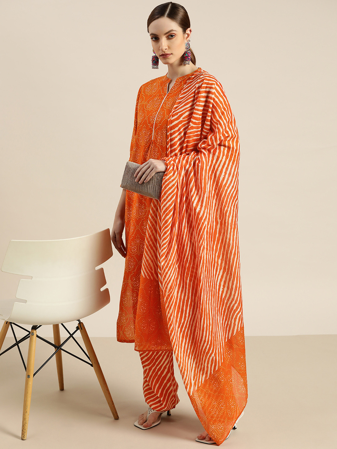 Moda Rapido Women Orange & Yellow Bandhani Print Kurta with Palazzos & Dupatta 
Moda Rapido Women Orange & Yellow Bandhani Print Kurta with Palazzos & Dupatta