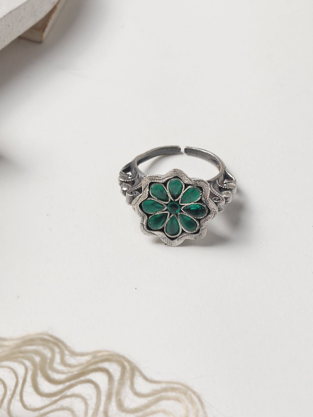 TEEJH Silver-Plated & Green Stone-Studded Flower Shaped Oxidised Adjustable Finger Ring
TEEJH Silver-Plated & Green Stone-Studded Flower Shaped Oxidised Adjustable Finger Ring