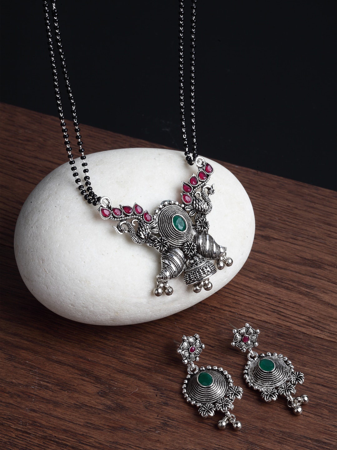 PANASH Oxidized Silver-Plated Pink & Green Stone-Studded & Beaded Mangalsutra With Earrings
PANASH Oxidized Silver-Plated Pink & Green Stone-Studded & Beaded Mangalsutra With Earrings