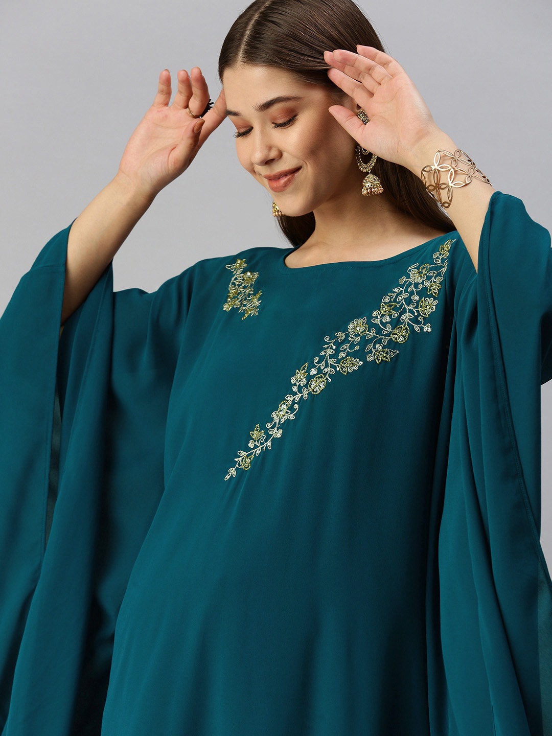 Global Desi Women Teal Blue Floral Embroidered Extended Sleeves Thread Work Kaftan Kurta
Global Desi Women Teal Blue Floral Embroidered Extended Sleeves Thread Work Kaftan Kurta