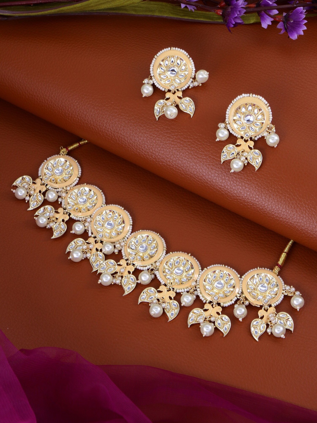 aadita Gold-Plated Yellow & White Kundan-Studded & Pearl Beaded Handcrafted Jewellery Set
aadita Gold-Plated Yellow & White Kundan-Studded & Pearl Beaded Handcrafted Jewellery Set