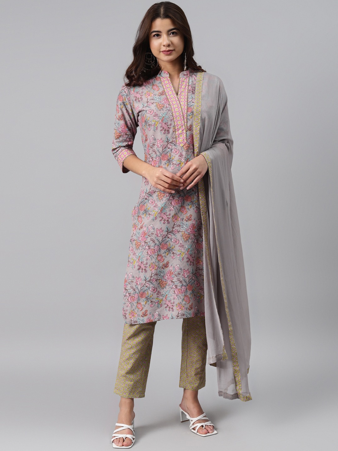 Gerua By Libas Women Grey Yellow Floral Printed Regular Pure Cotton Kurta with Trousers Dupatta
Gerua By Libas Women Grey Yellow Floral Printed Regular Pure Cotton Kurta with Trousers Dupatta