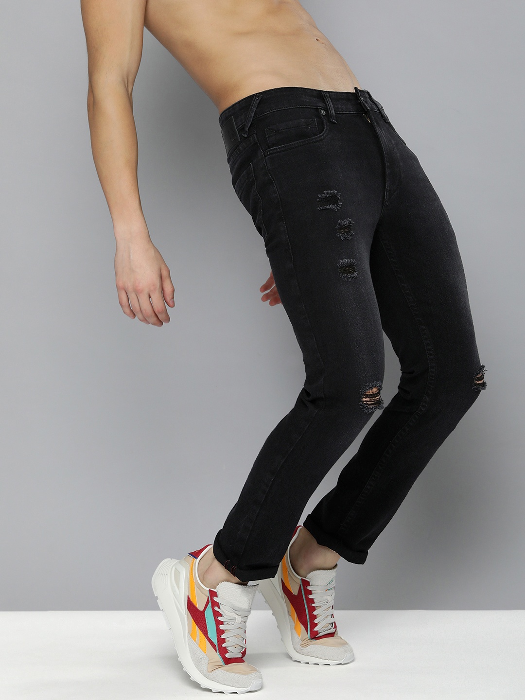 HERE&NOW Men Black Skinny Fit Highly Distressed Light Fade Mid-Rise Stretchable Jeans
HERE&NOW Men Black Skinny Fit Highly Distressed Light Fade Mid-Rise Stretchable Jeans