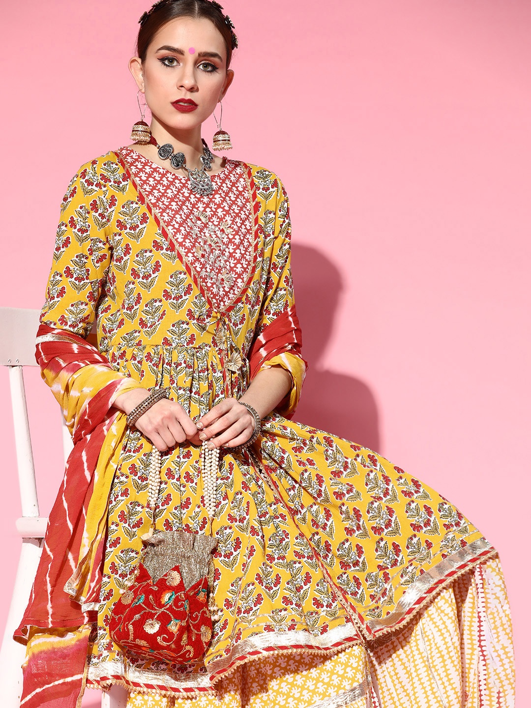 Ishin Women Floral Yoke Design Gotta Patti Cotton Kurta with Sharara & Dupatta, Mustard
Ishin Women Floral Yoke Design Gotta Patti Cotton Kurta with Sharara & Dupatta, Mustard