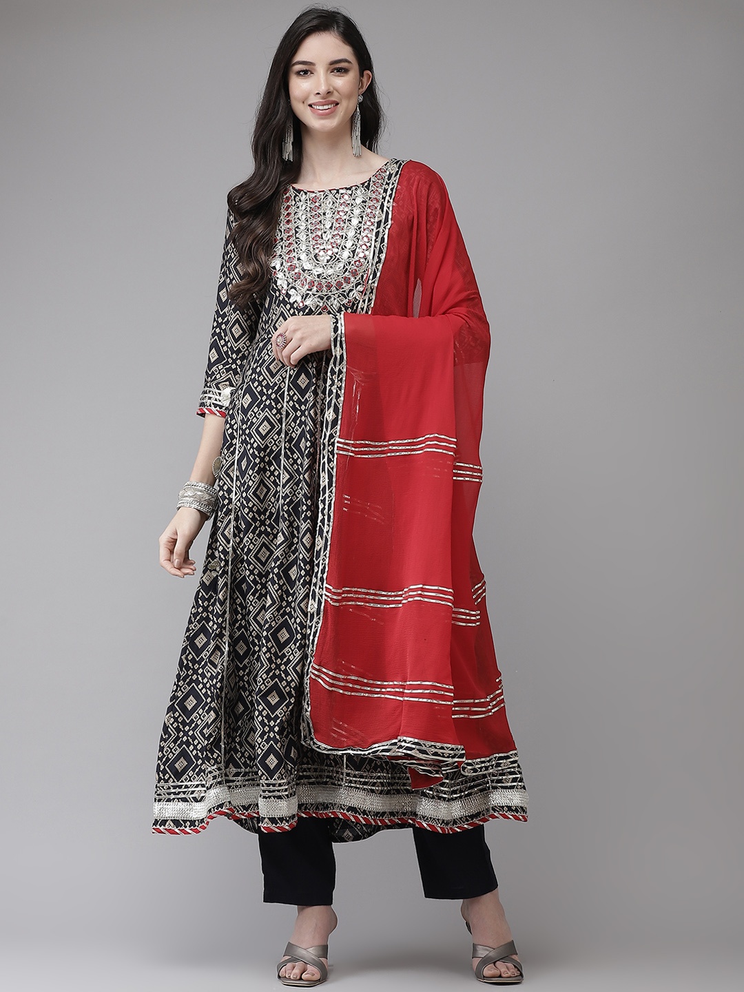 Ishin Women Navy Blue Ethnic Motifs Embroidered Panelled Gotta Patti Kurta with Trousers & With Dupatta
Ishin Women Navy Blue Ethnic Motifs Embroidered Panelled Gotta Patti Kurta with Trousers & With Dupatta