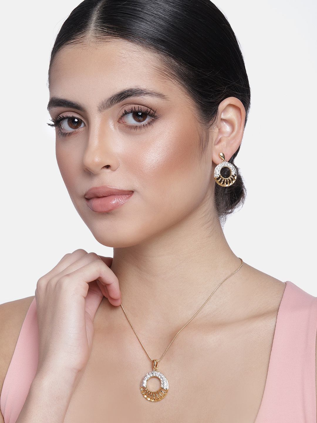Estele Women Gold Plated Austrian Crystals Studded Circular Design Jewellery Set
Estele Women Gold Plated Austrian Crystals Studded Circular Design Jewellery Set