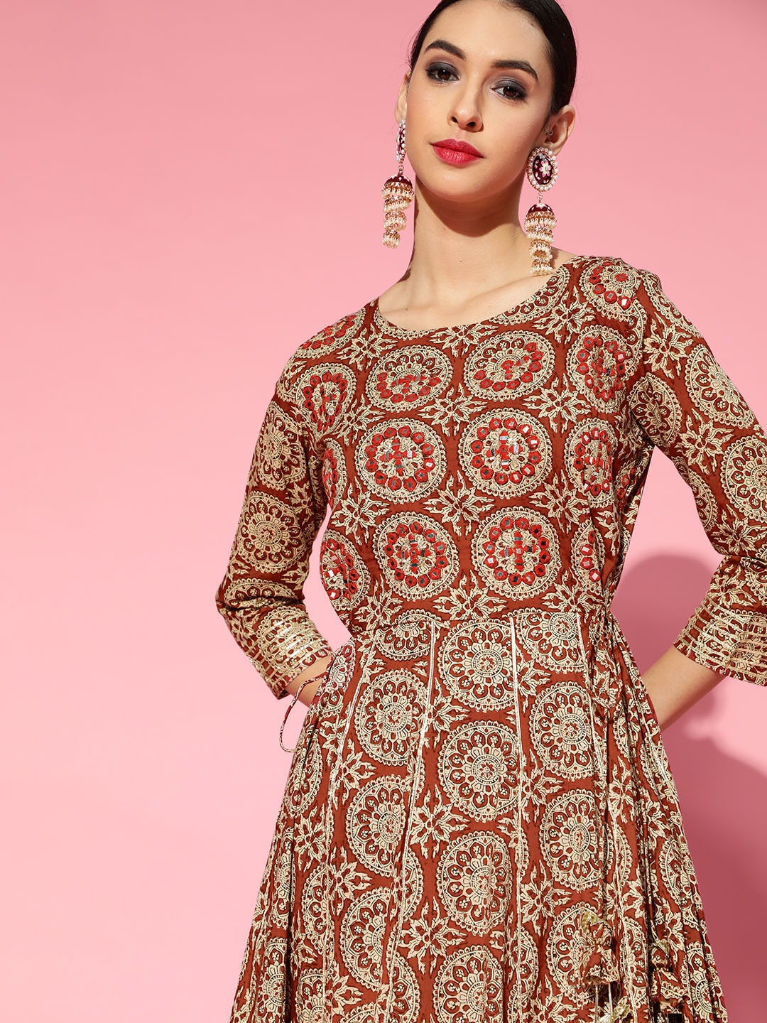 Ishin Mirror Embroidered Ethnic Motifs Floral Printed Panelled Anarkali Kurta, Brown
Ishin Mirror Embroidered Ethnic Motifs Floral Printed Panelled Anarkali Kurta, Brown