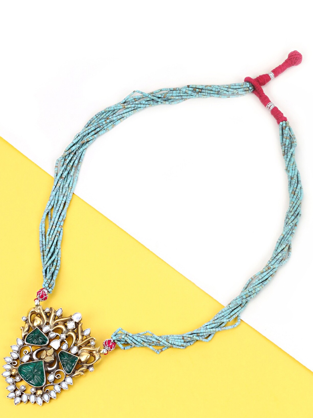 SANGEETA BOOCHRA Women Gold-Toned & Blue Beads Beaded & Stone Studded Pendent Necklace
SANGEETA BOOCHRA Women Gold-Toned & Blue Beads Beaded & Stone Studded Pendent Necklace