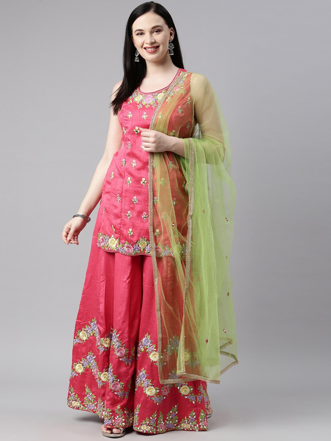 Neerus Women Coral & Green Embroidered Panelled Aari Work Kurta With Skirt & Dupatta
Neerus Women Coral & Green Embroidered Panelled Aari Work Kurta With Skirt & Dupatta