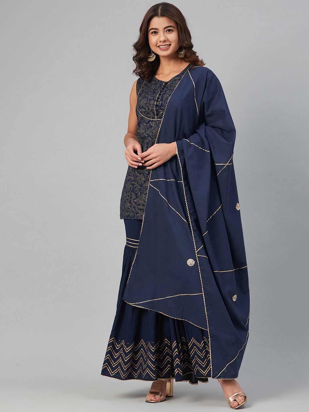 Hatheli Women Blue Ethnic Motifs Printed Layered Pure Cotton Kurti with Sharara & With Dupatta
Hatheli Women Blue Ethnic Motifs Printed Layered Pure Cotton Kurti with Sharara & With Dupatta