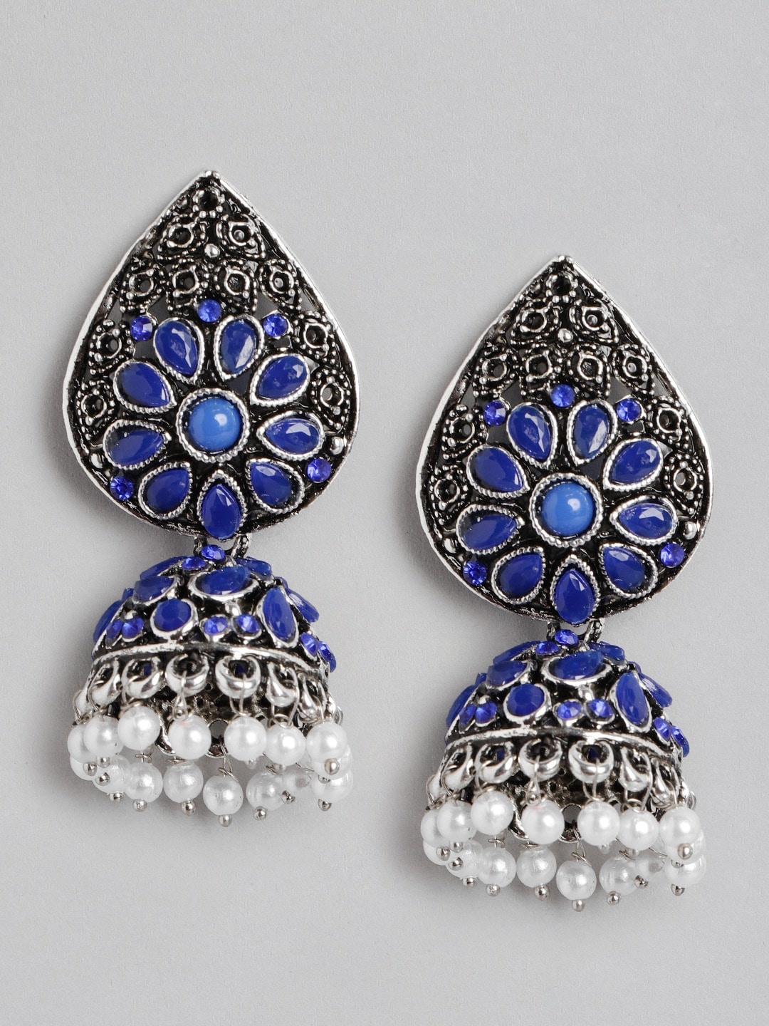 Anouk Oxidised Silver-Toned & Blue Stone Studded & Beaded Dome Shaped Jhumkas Earrings
Anouk Oxidised Silver-Toned & Blue Stone Studded & Beaded Dome Shaped Jhumkas Earrings