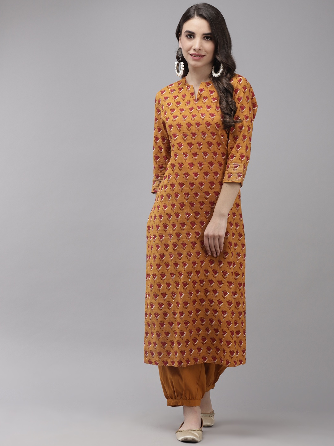 Ishin Women Mustard Yellow Floral Embroidered Regular Sequinned Pure Cotton Kurta with Salwar
Ishin Women Mustard Yellow Floral Embroidered Regular Sequinned Pure Cotton Kurta with Salwar