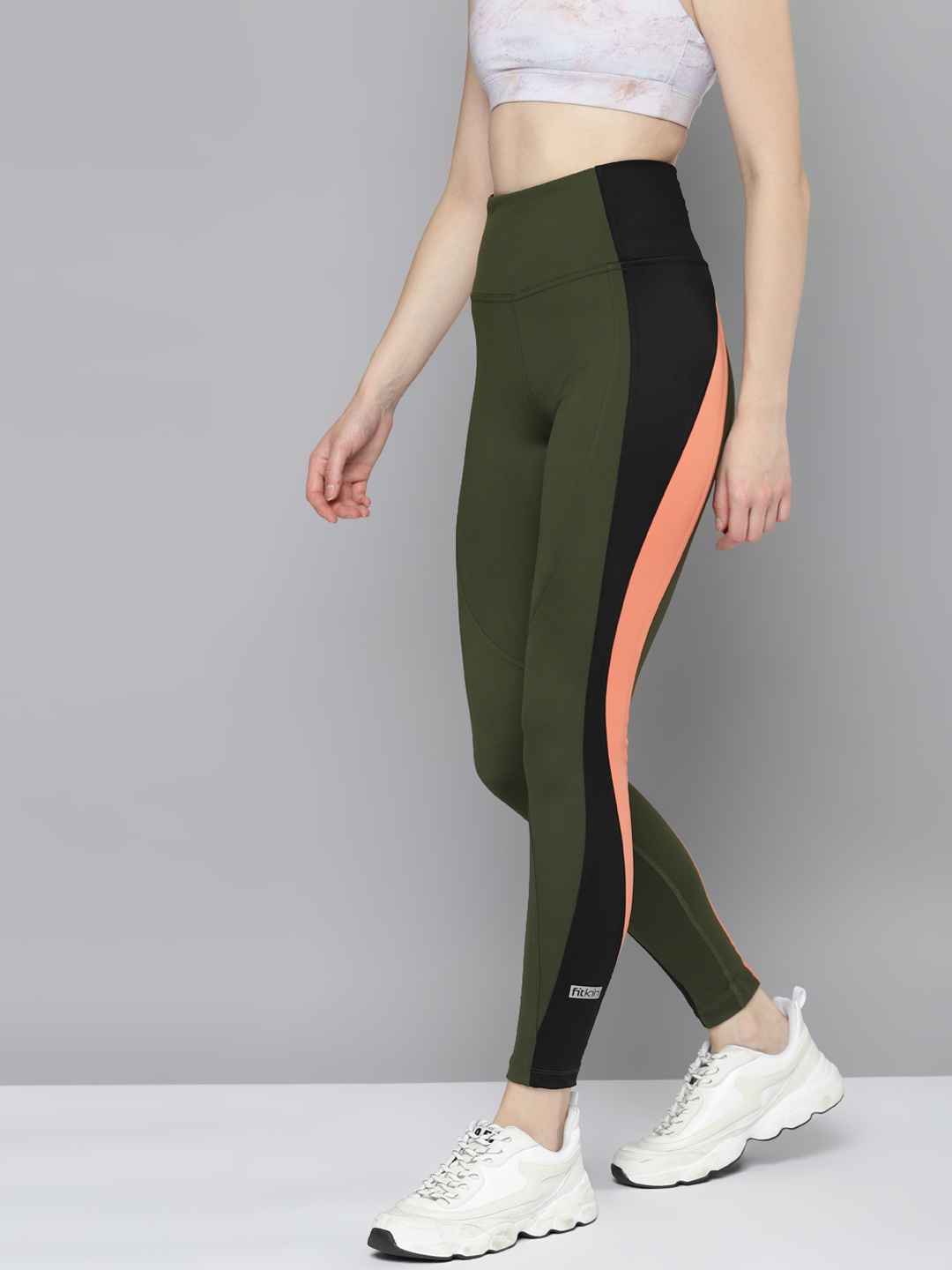 Fitkin Women Olive Green & Black Solid Rapid Dry Training Tights with Side Taping Detail
Fitkin Women Olive Green & Black Solid Rapid Dry Training Tights with Side Taping Detail