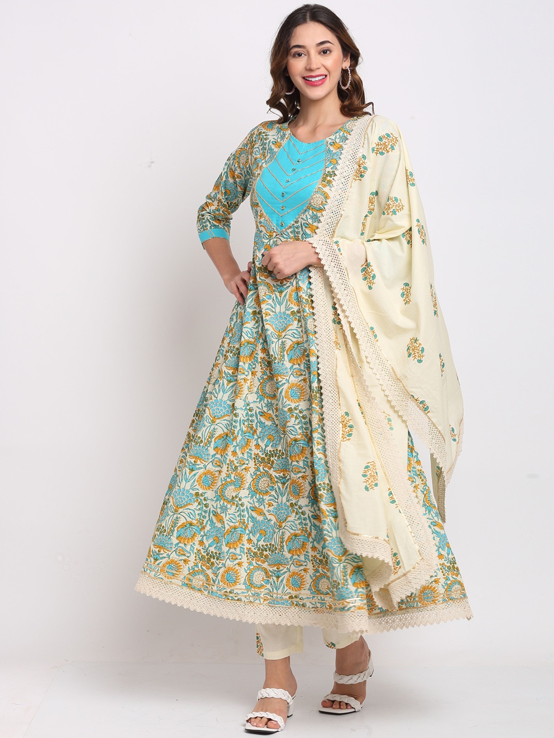 Rajnandini Women Beige Floral Printed Regular Pure Cotton Kurta with Trousers & With Dupatta
Rajnandini Women Beige Floral Printed Regular Pure Cotton Kurta with Trousers & With Dupatta