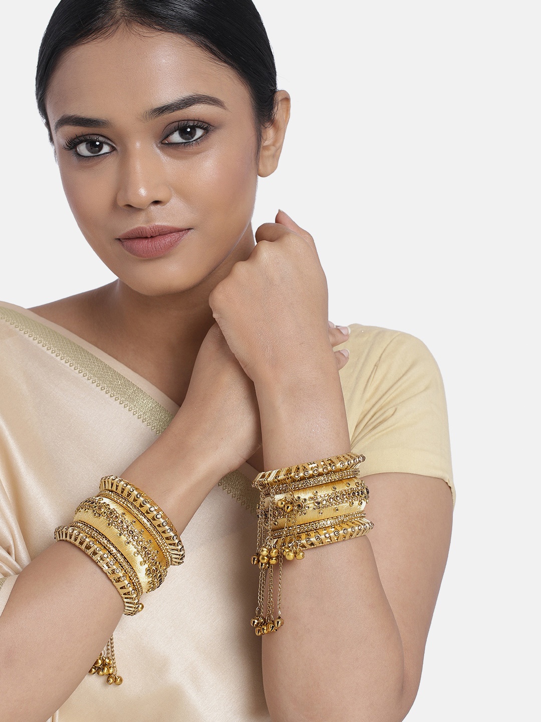 Peora Set of 10 Beige Handcrafted Silk Thread Kundan Floral Studded Chuda Bangles
Peora Set of 10 Beige Handcrafted Silk Thread Kundan Floral Studded Chuda Bangles