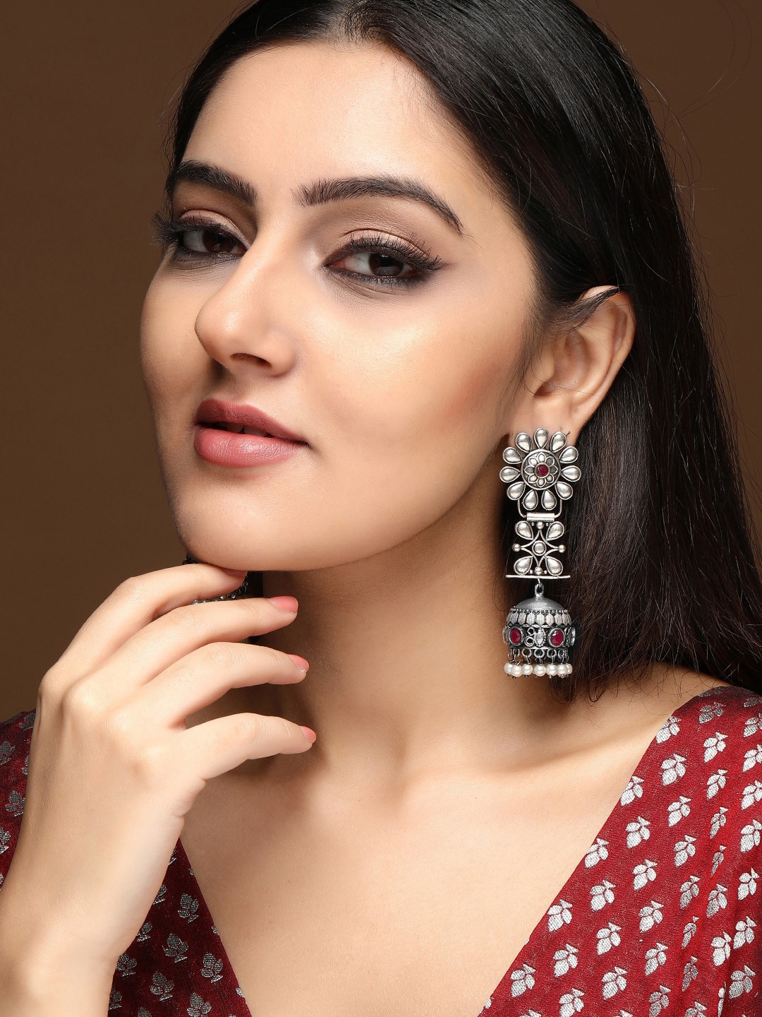 Rubans Oxidised Silver-Plated Jhumka Earrings with Ruby Red Stones and White Pearl Beads
Rubans Oxidised Silver-Plated Jhumka Earrings with Ruby Red Stones and White Pearl Beads