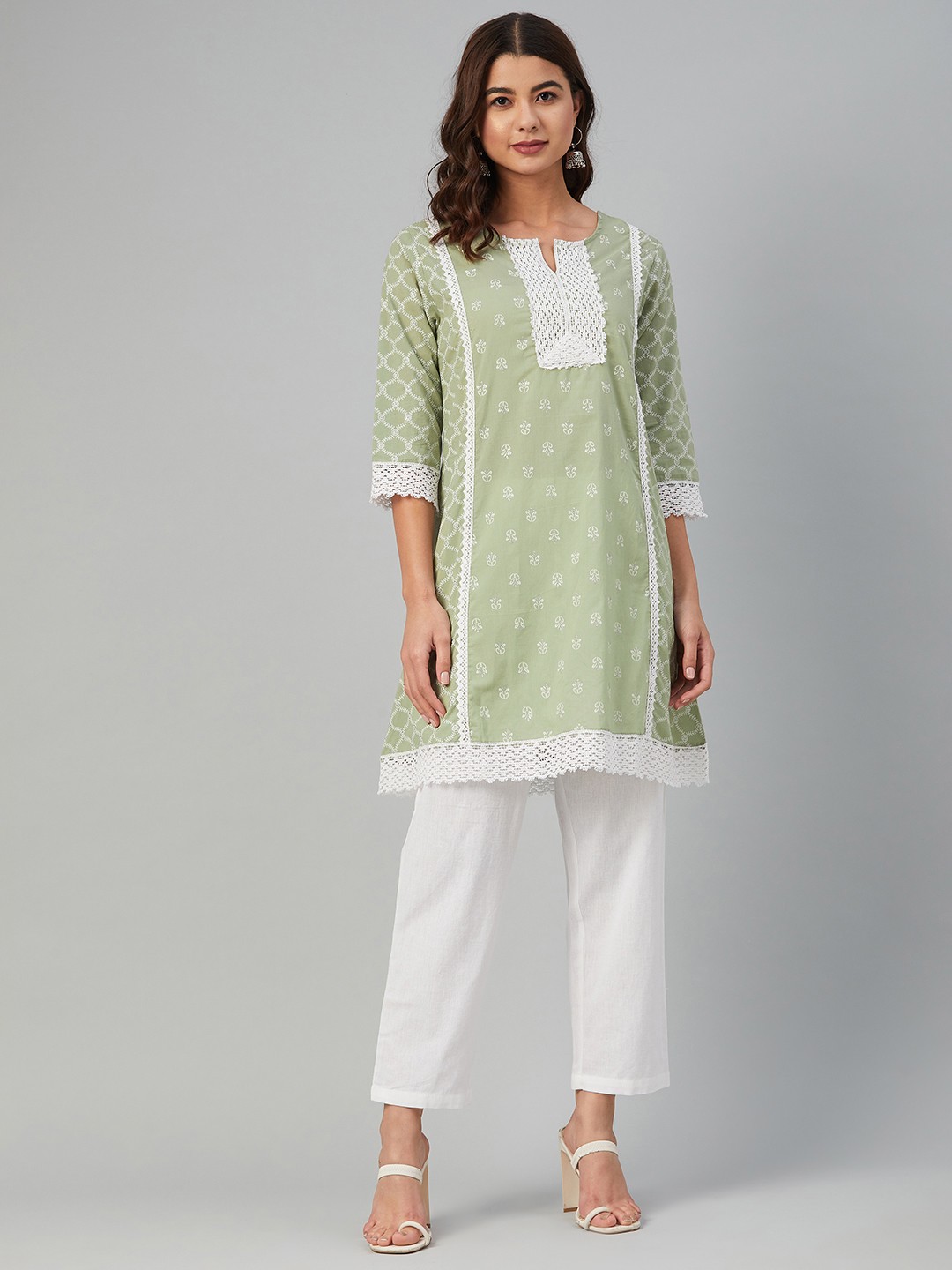 Yuris Women Green Ethnic Motifs Printed Panelled Thread Work Pure Cotton Kurta with Trousers
Yuris Women Green Ethnic Motifs Printed Panelled Thread Work Pure Cotton Kurta with Trousers