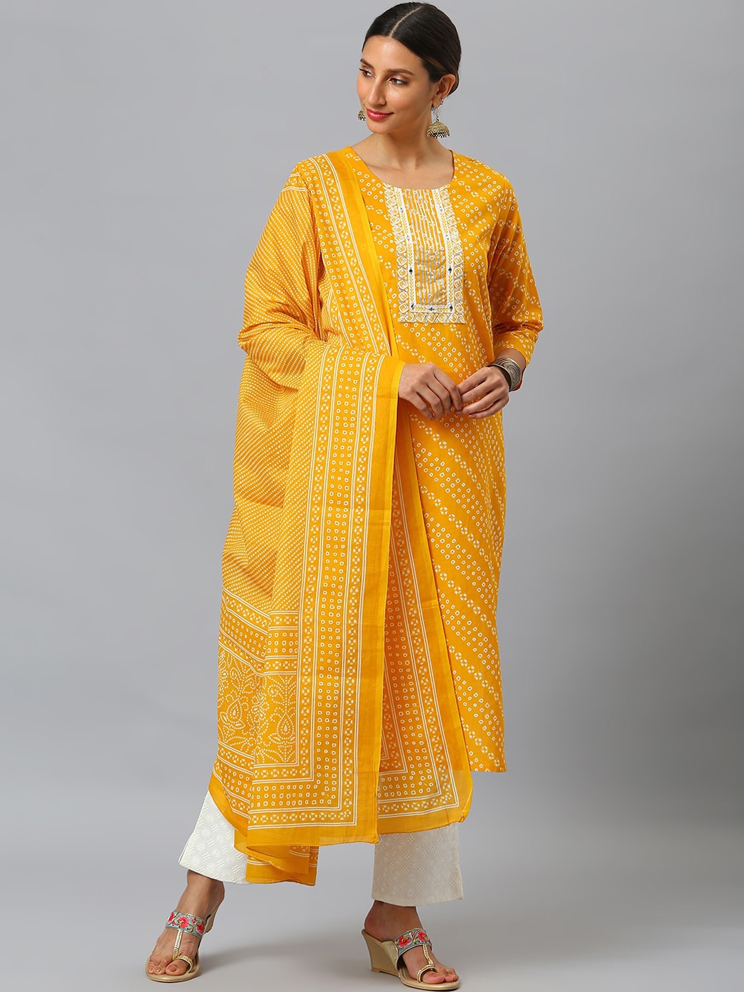 SIAH Women Yellow Printed Regular Mirror Work Pure Cotton Kurta with Trousers & With Dupatta
SIAH Women Yellow Printed Regular Mirror Work Pure Cotton Kurta with Trousers & With Dupatta