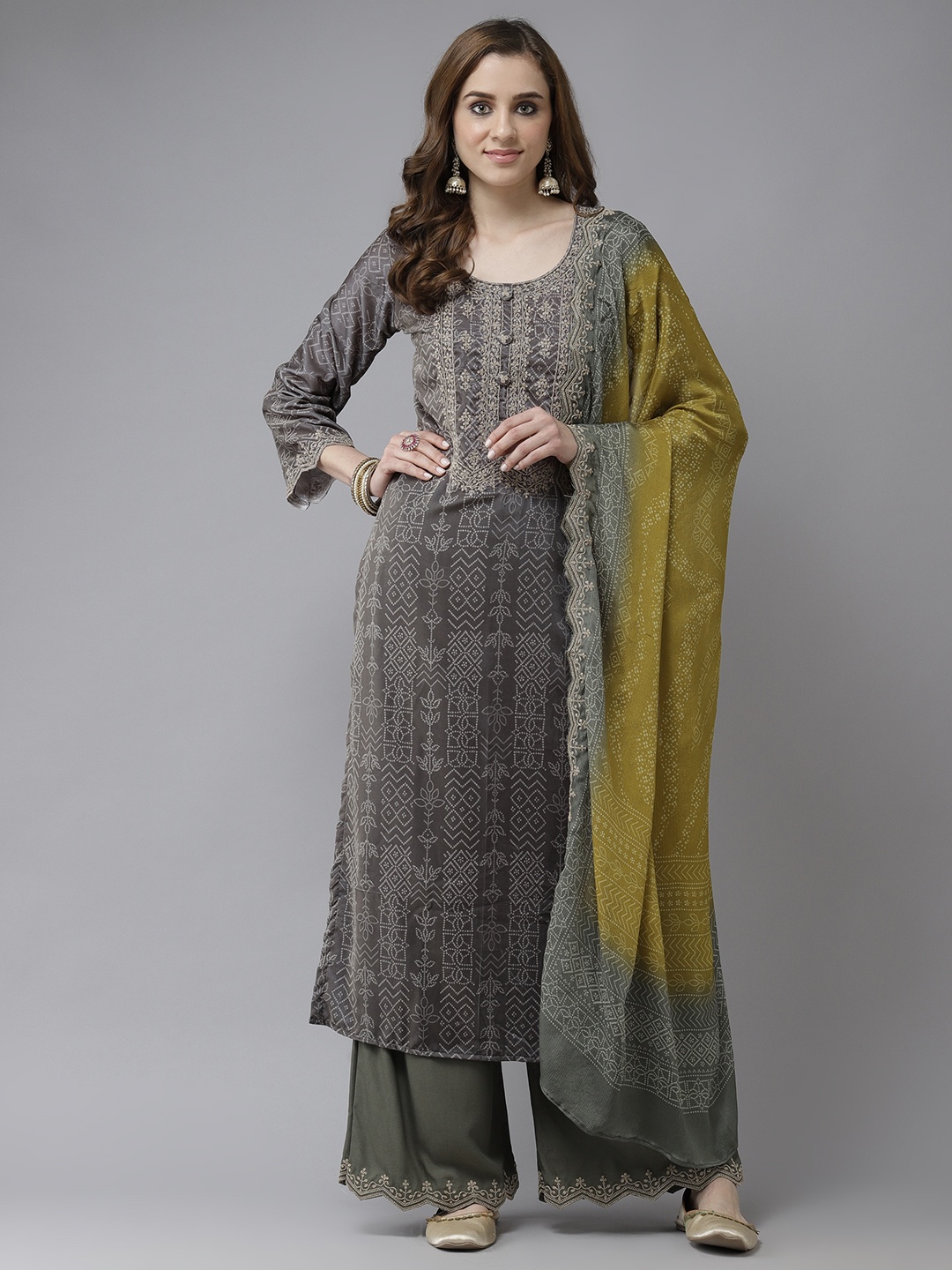 Indo Era Grey & Gold Bandhani Embroidered Zari Velvet Kurta with Palazzos & With Dupatta
Indo Era Grey & Gold Bandhani Embroidered Zari Velvet Kurta with Palazzos & With Dupatta