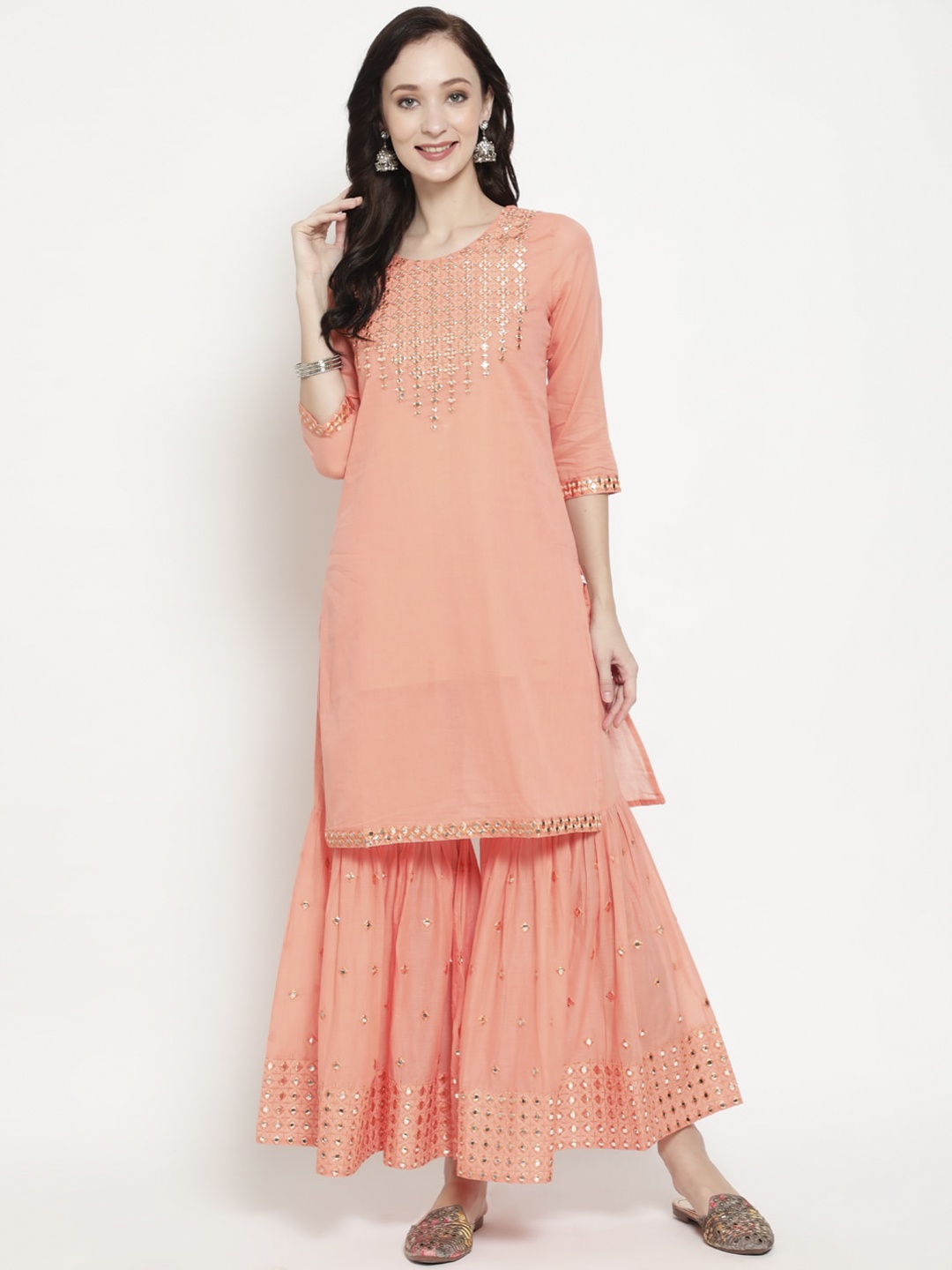 antaran Women Peach-Coloured Floral Embroidered Regular Pure Cotton Kurta with Sharara
antaran Women Peach-Coloured Floral Embroidered Regular Pure Cotton Kurta with Sharara