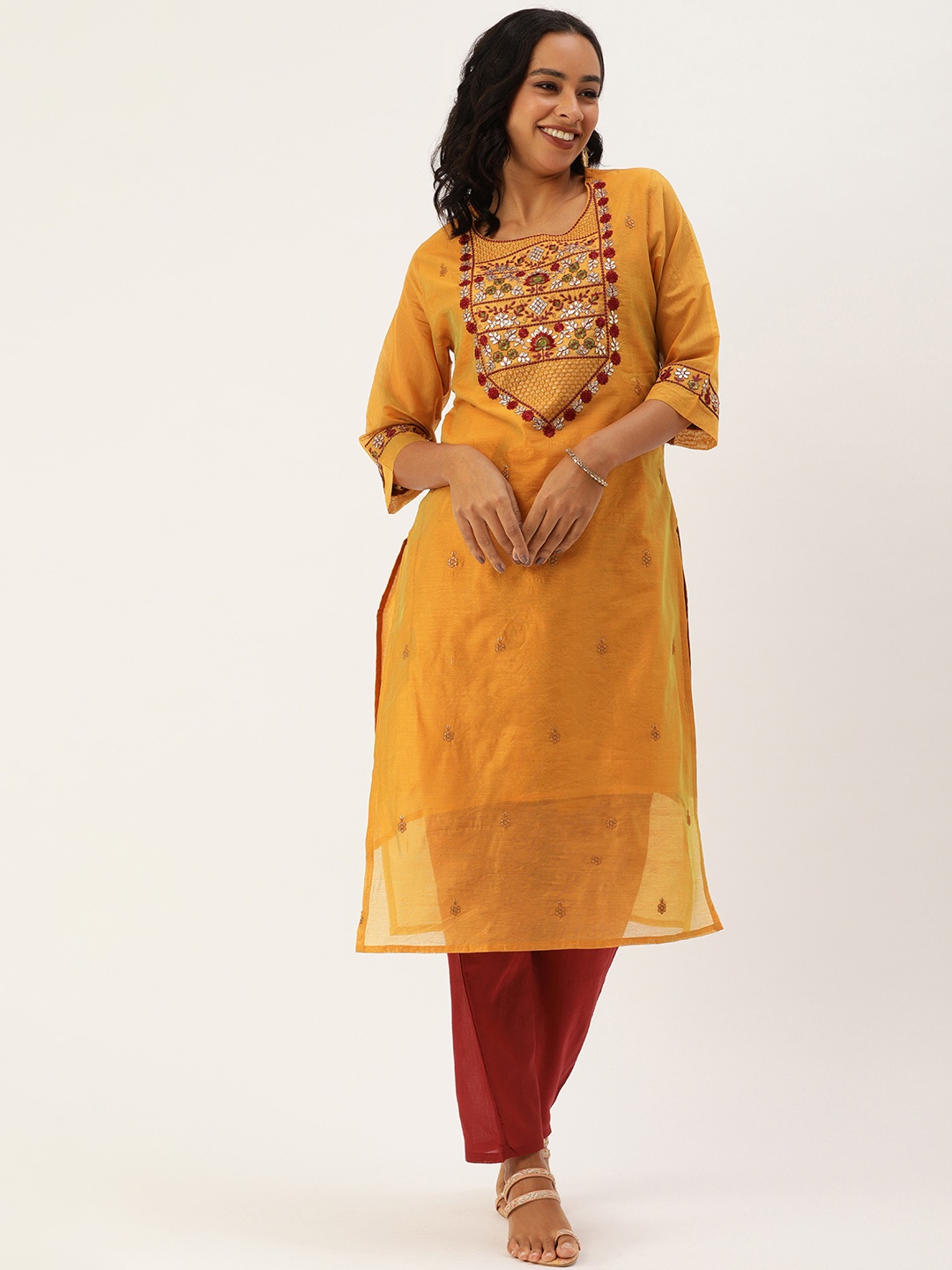 SWAGG INDIA Mustard Yellow Silk Blend Embroidered Mirror Work Kurta with Trousers
SWAGG INDIA Mustard Yellow Silk Blend Embroidered Mirror Work Kurta with Trousers