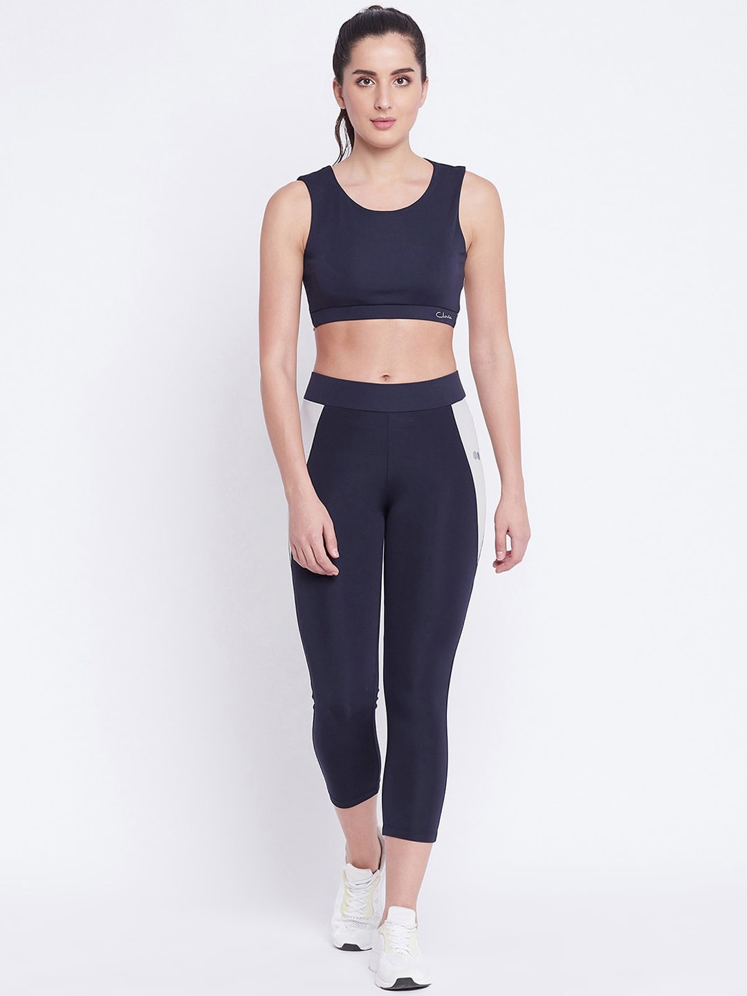 Clovia Women Blue & Grey Colourblocked Snug Fit Active Tights & Padded Sports Bra Set