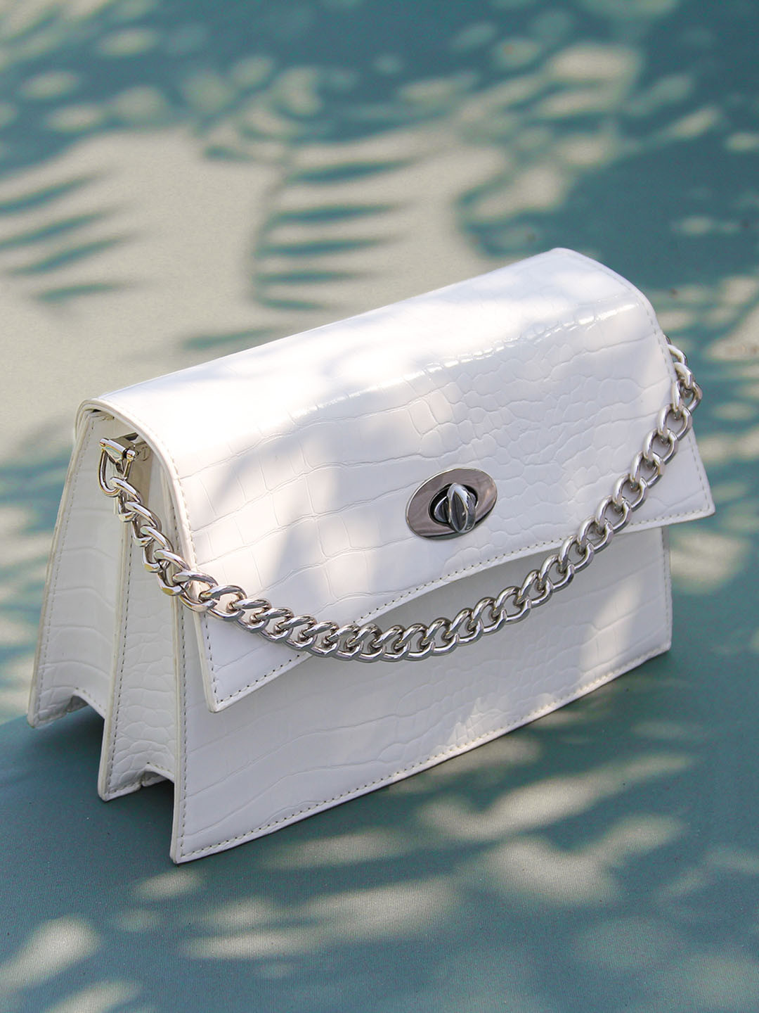 Kazo White PU Structured Sling Bag
Kazo White PU Structured Sling Bag