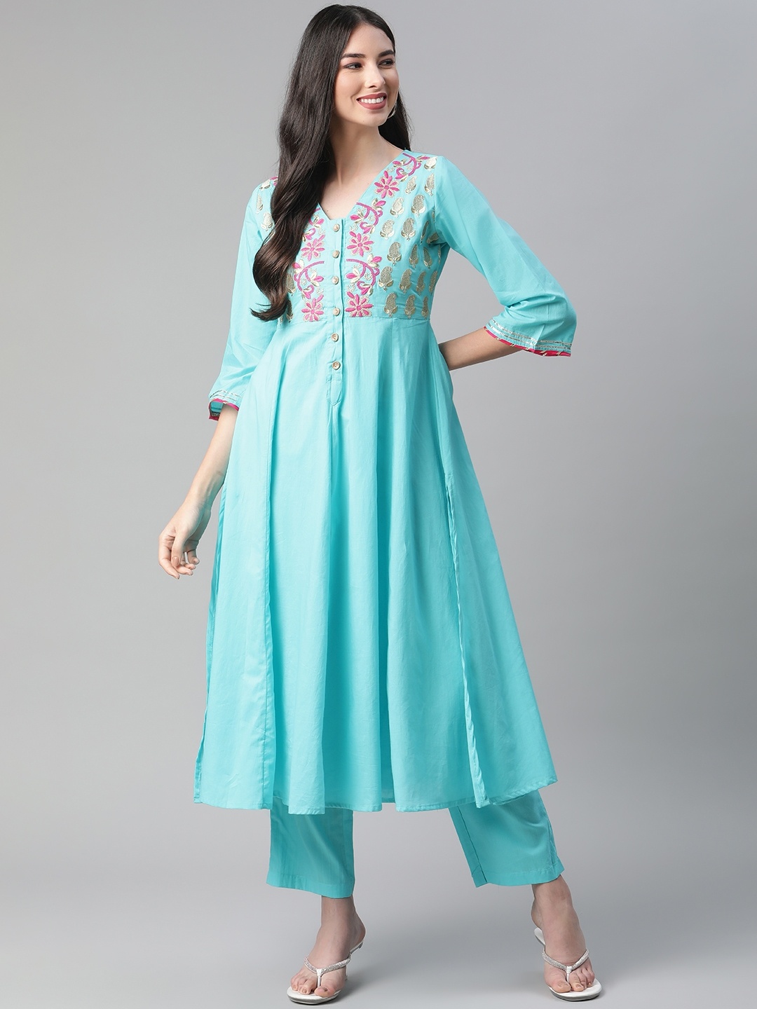 Sakhi Jaipur Women Blue Floral Yoke Design Pleated Zari Cotton A-Line Kurta with Trousers
Sakhi Jaipur Women Blue Floral Yoke Design Pleated Zari Cotton A-Line Kurta with Trousers