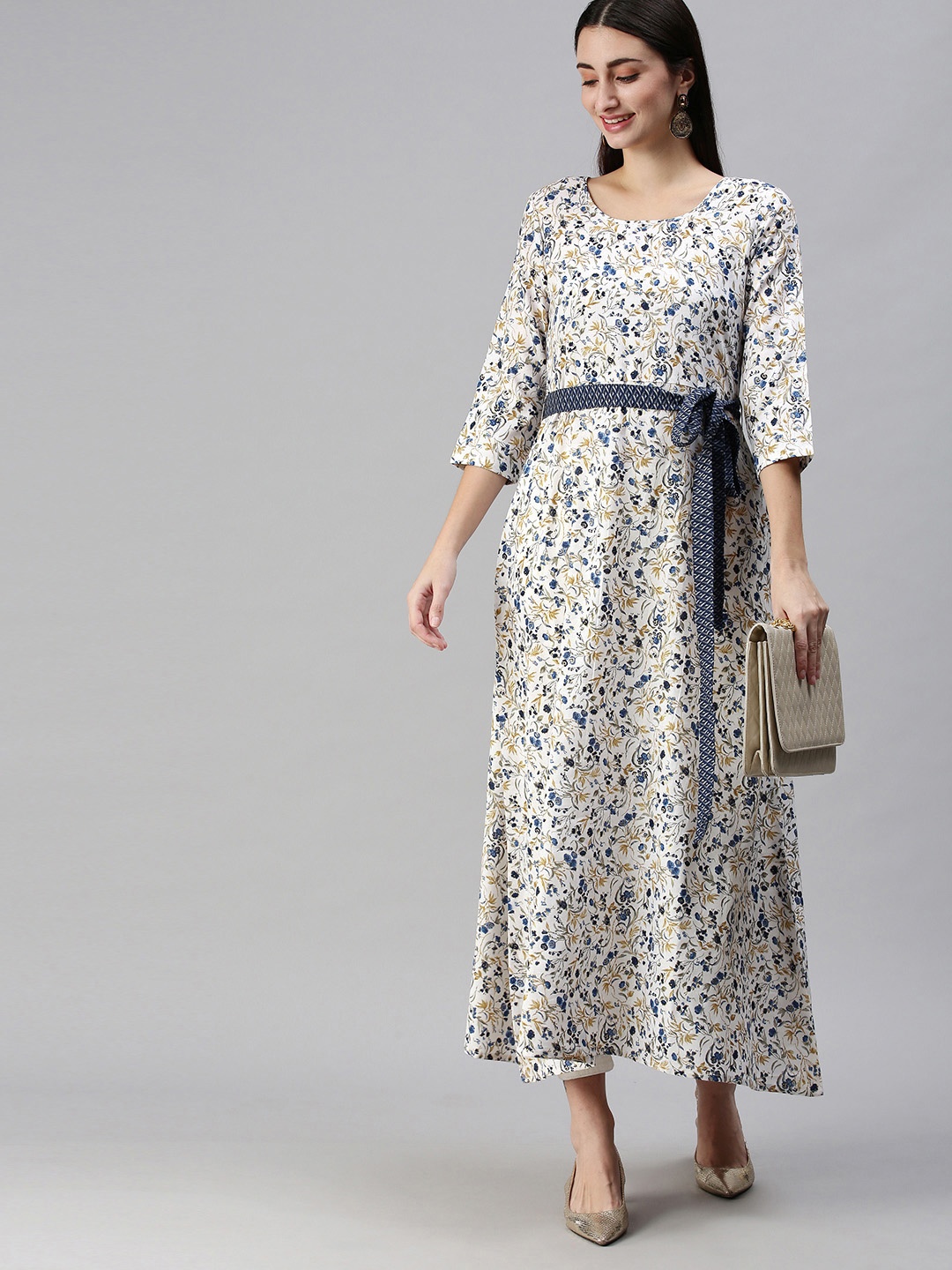 SheWill Women White & Blue Floral Printed Round Neck Belted Detail Cotton A Line Kurta
SheWill Women White & Blue Floral Printed Round Neck Belted Detail Cotton A Line Kurta