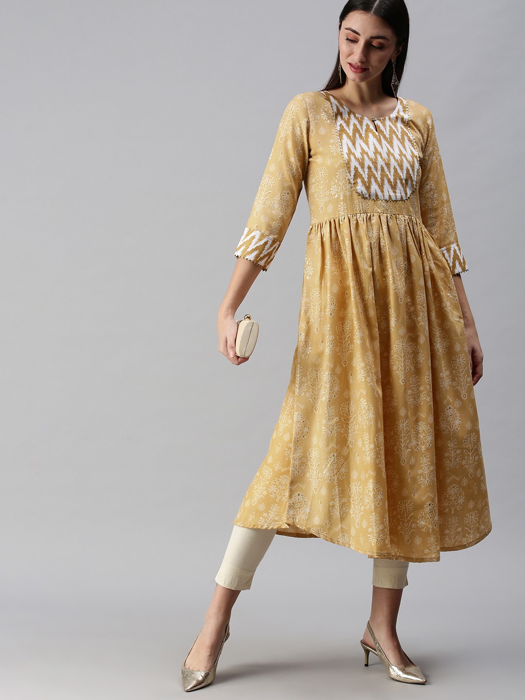 SheWill Women Mustard Yellow Ethnic Motifs Ikat Printed Gotta Patti Cotton Anarkali Kurta
SheWill Women Mustard Yellow Ethnic Motifs Ikat Printed Gotta Patti Cotton Anarkali Kurta