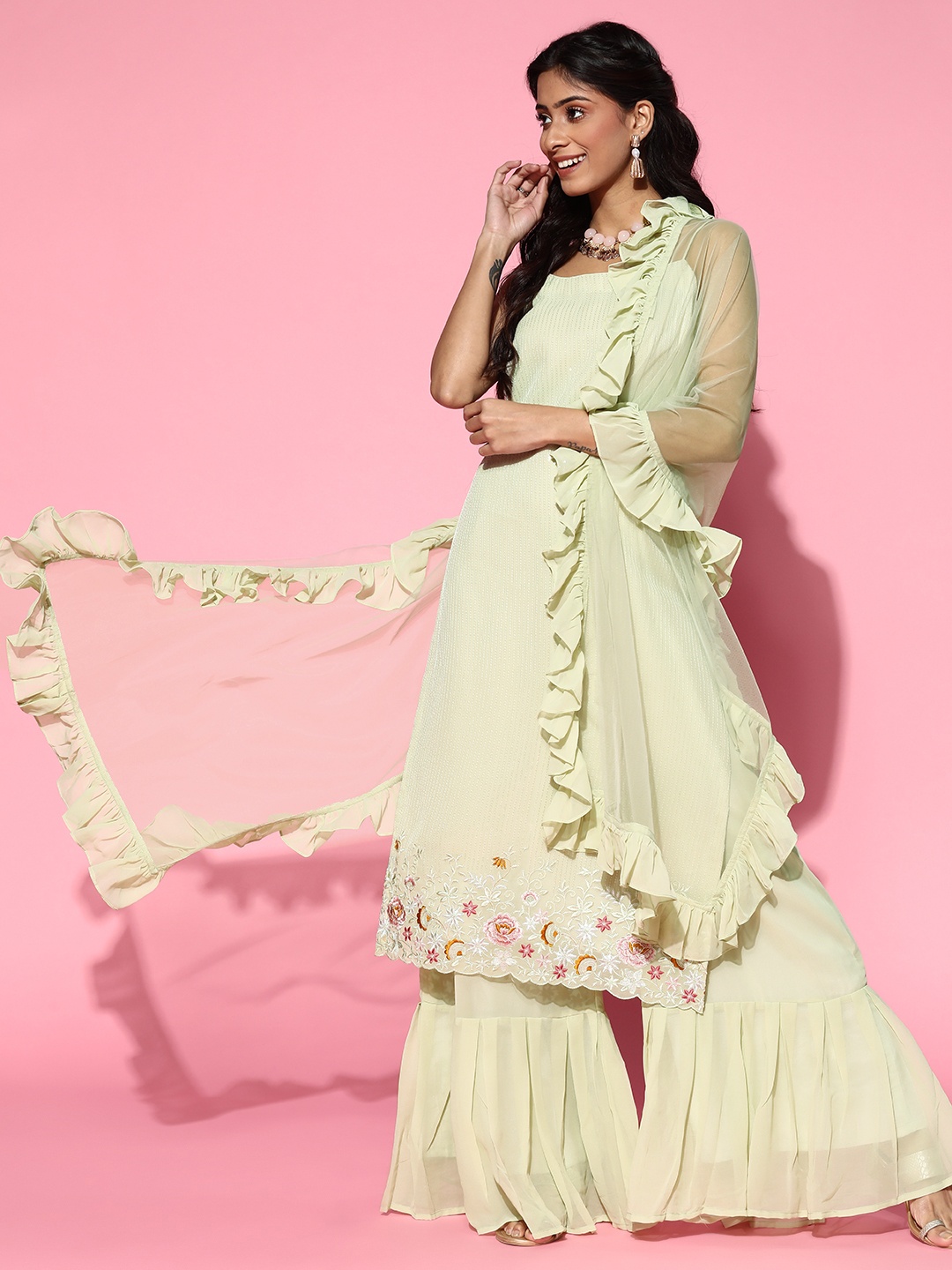 Inddus Women Sage Green Sequinned Embroidered Kurta with Sharara and Ruffled Dupatta
Inddus Women Sage Green Sequinned Embroidered Kurta with Sharara and Ruffled Dupatta