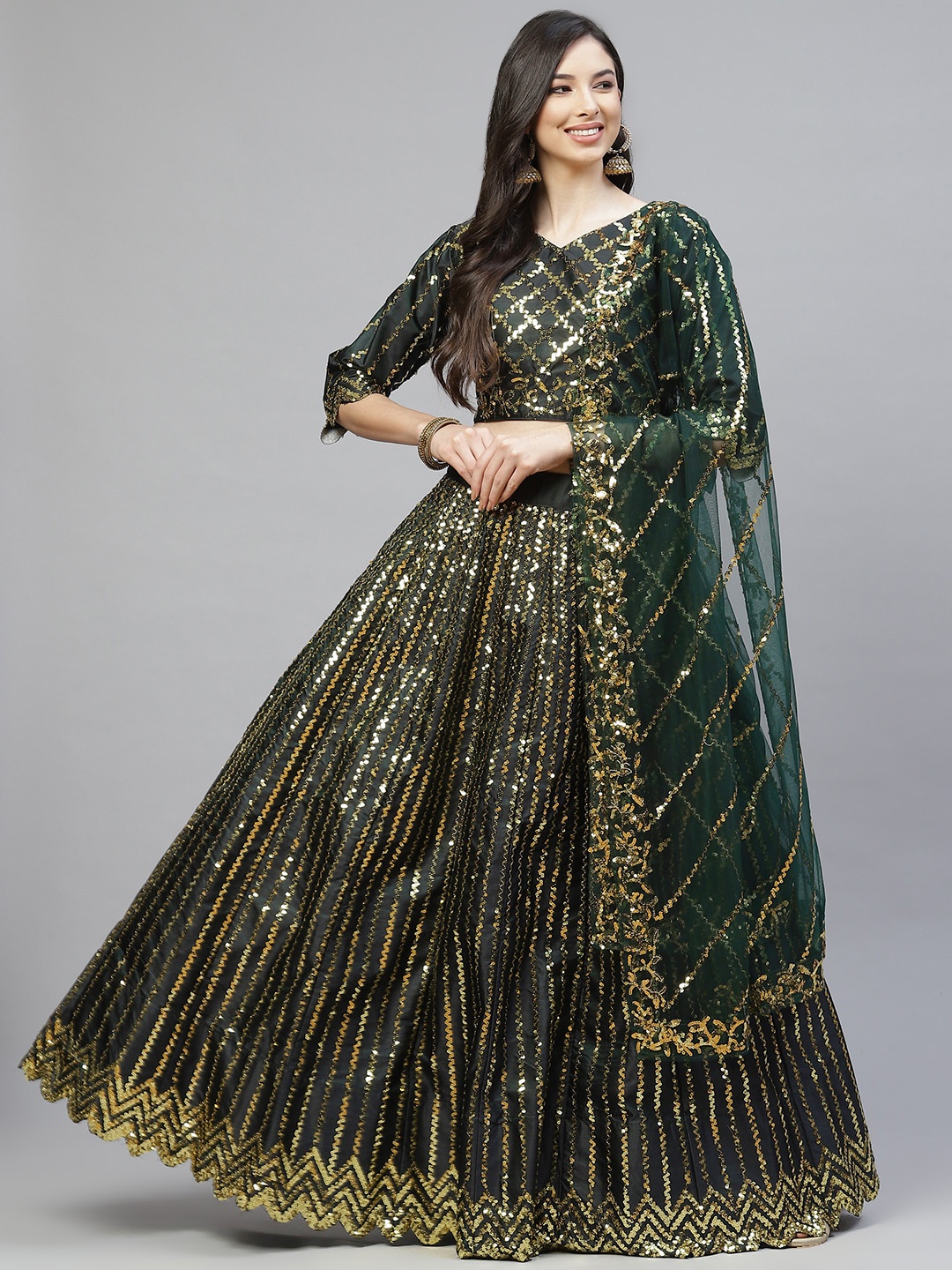 Readiprint Fashions Green & Gold-Toned Embellished Sequinned Semi-Stitched Lehenga Choli
Readiprint Fashions Green & Gold-Toned Embellished Sequinned Semi-Stitched Lehenga Choli