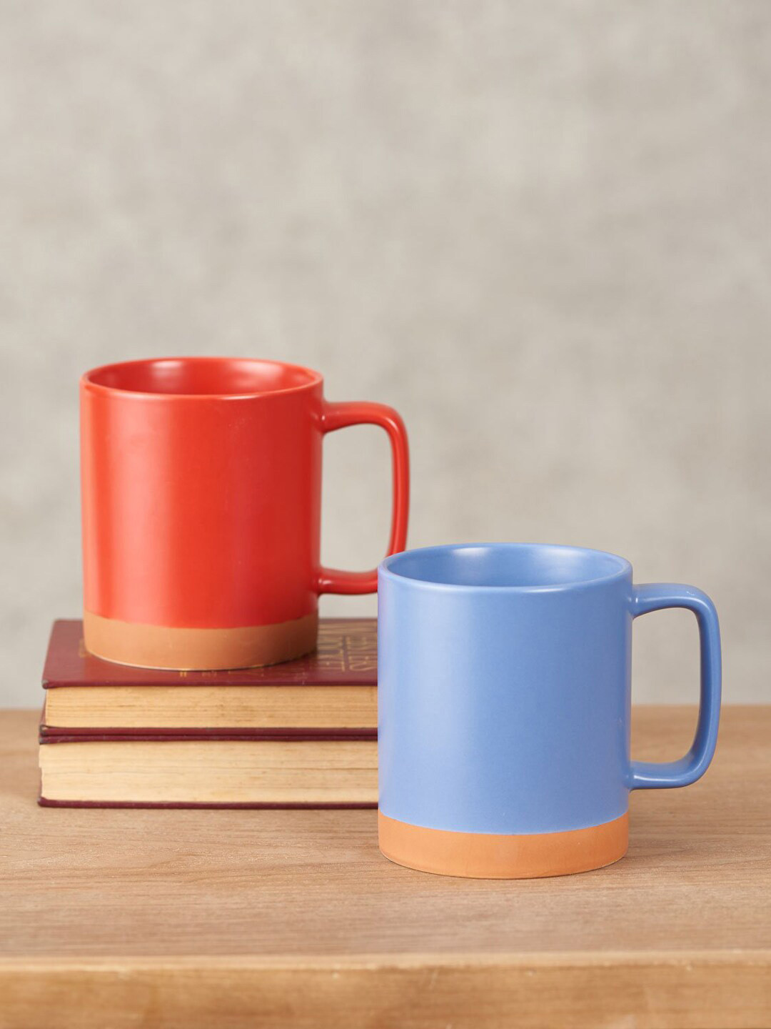 THEDECORKART Set-2 Red & Blue Solid Ceramic Glossy Cups and Mugs
THEDECORKART Set-2 Red & Blue Solid Ceramic Glossy Cups and Mugs