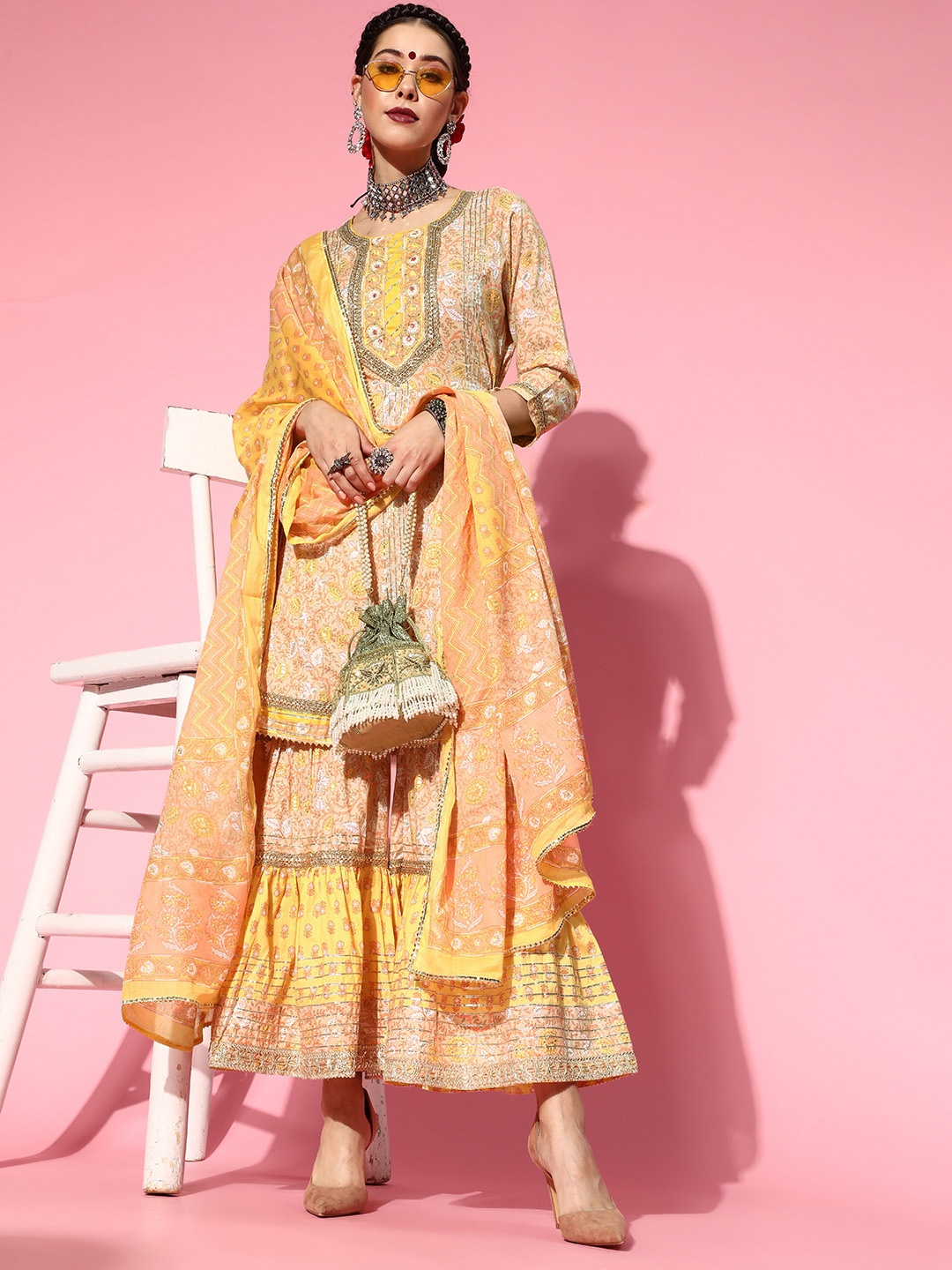 Ishin Beige & Yellow Floral Foil Print Gotta Patti Tie-Ups A-Line Kurta Sharara & Dupatta
Ishin Beige & Yellow Floral Foil Print Gotta Patti Tie-Ups A-Line Kurta Sharara & Dupatta