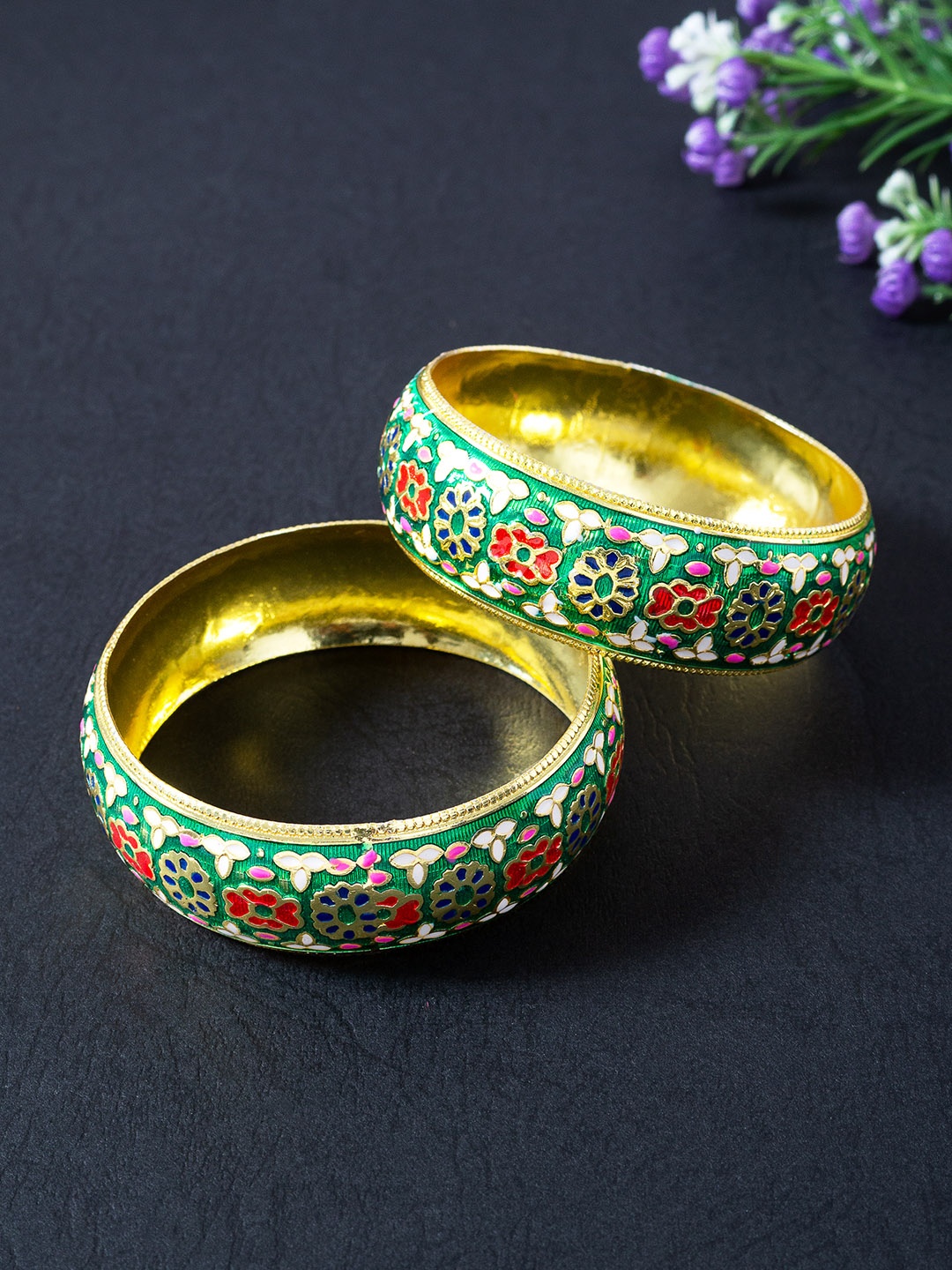 Golden Peacock Set Of 2 Green & Gold-Toned Handcrafted Floral Design Meenakari Bangles
Golden Peacock Set Of 2 Green & Gold-Toned Handcrafted Floral Design Meenakari Bangles